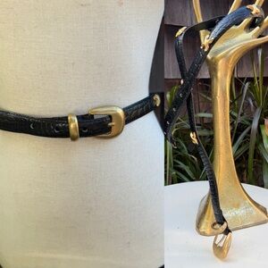Vtg  80s skinny belt black leather gold tone x’s buckle accents fits 27/30” Sz M
